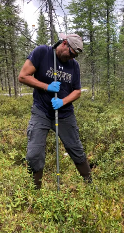 Joel Kostka takes soil samples at the SPRUCE facility in Minnesota. Joel Kostka takes soil samples at the SPRUCE facility in Minnesota.